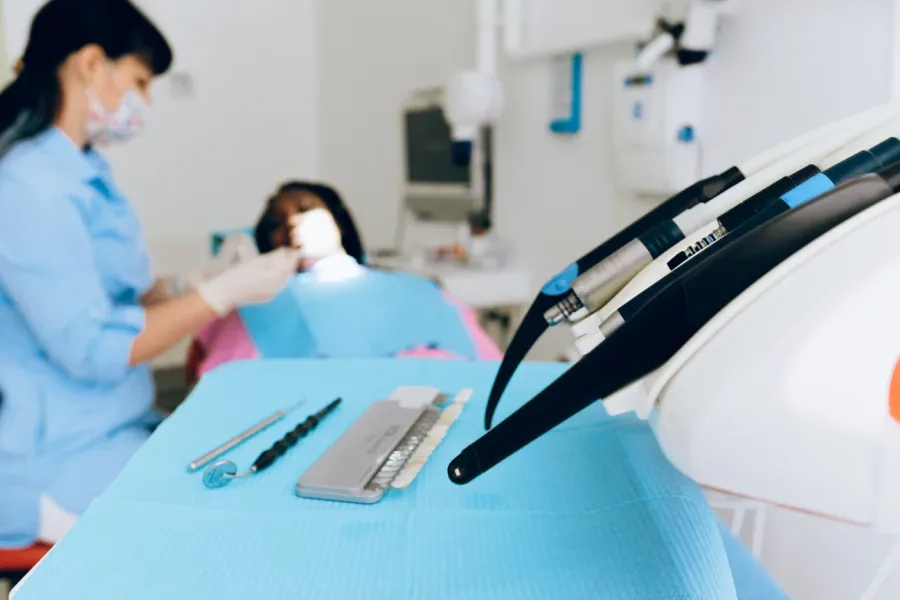 woman being treated in a dental institute